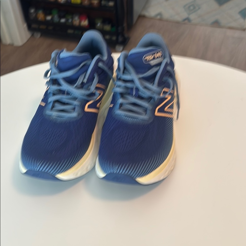 New Balance Blue Sneakers with Sleek Design and Cushioning